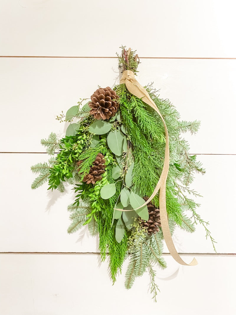 Door Swag with Magnolia, Pine Cones and Eucalyptus with Ribbon