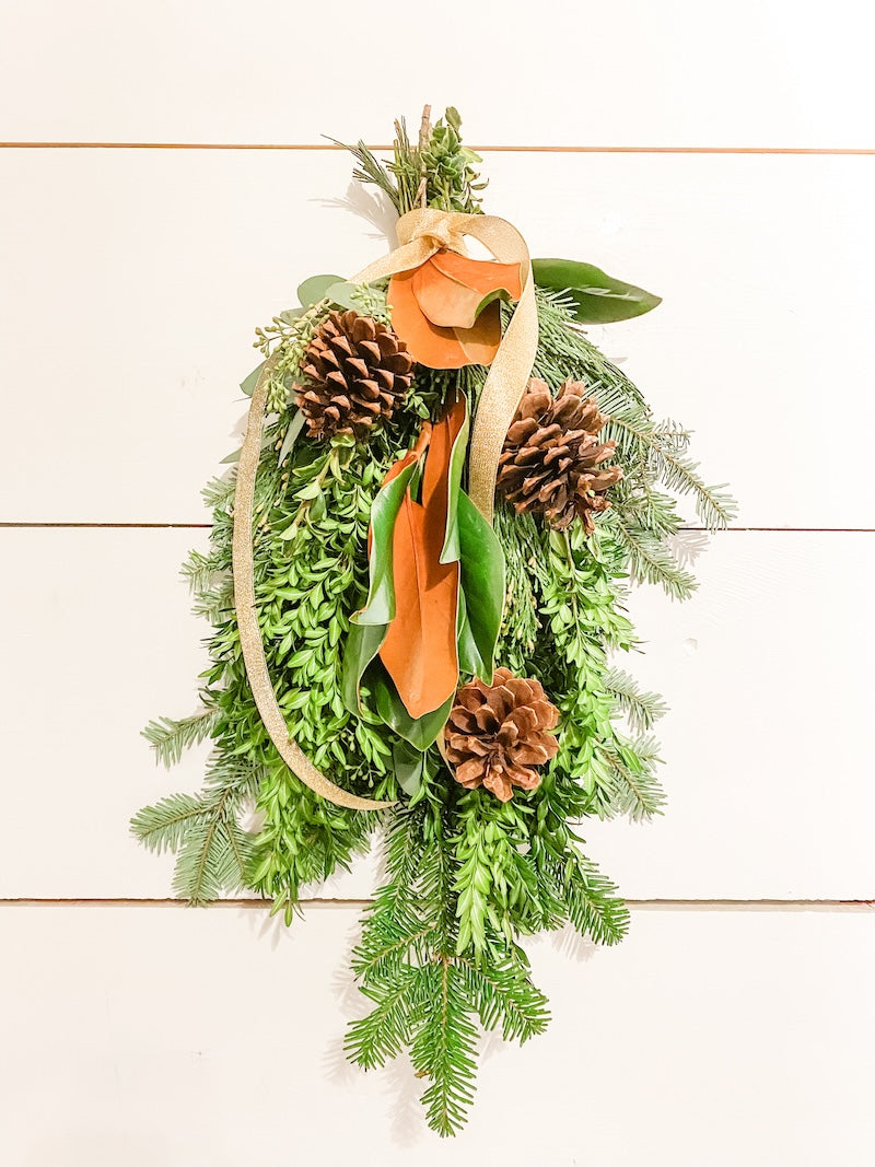 Door Swag with Magnolia and Pine Cones with Ribbon